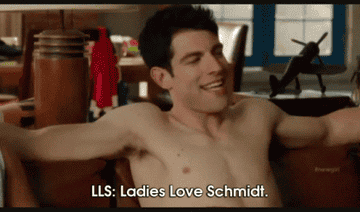 GIF of topless Schmidt saying LLS: Ladies Love Schmidt on New Girl