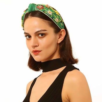A model wearing the green one