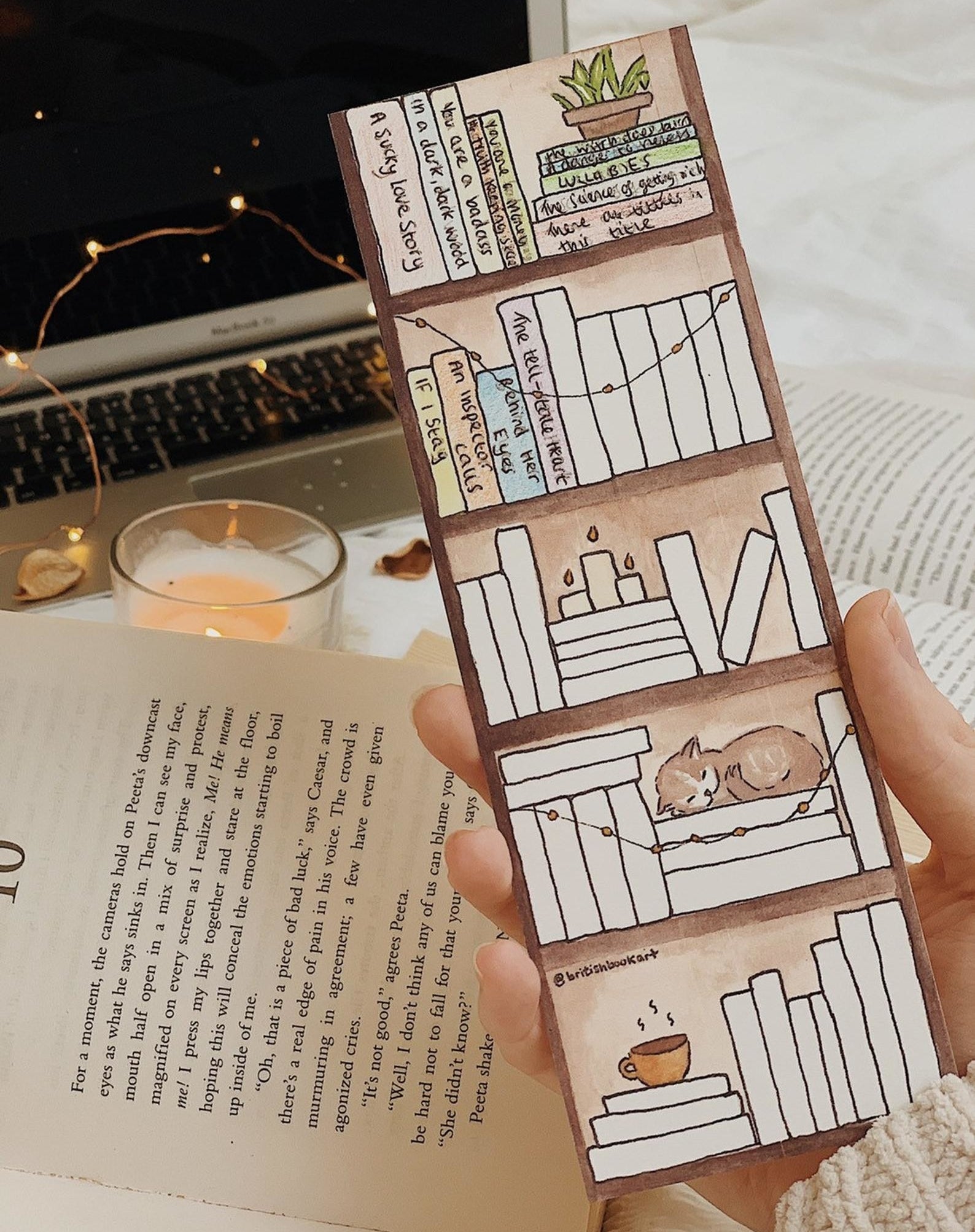 a person holding the bookmark