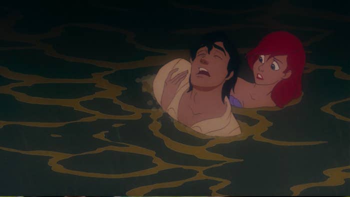 Ariel pulls Eric out of the water