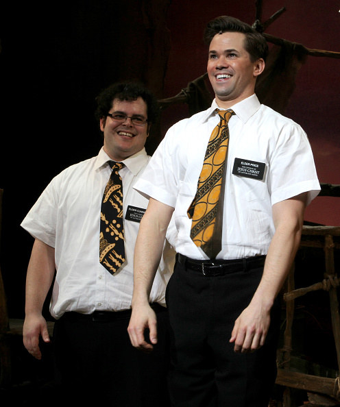 Elder Price and Cunningham singing onstage 