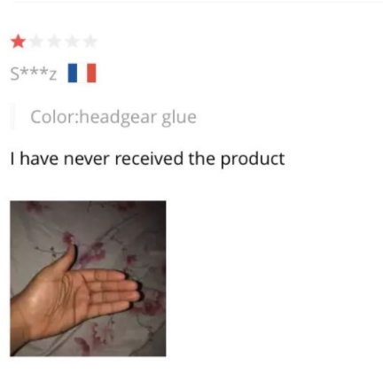 Review with a hand holding nothing, saying they never received the product