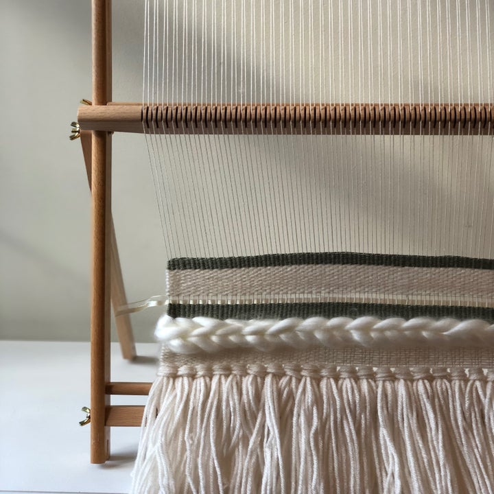 A zoomed in shot of a weaving in progress