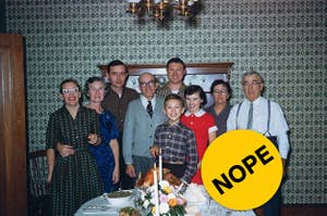 Multi-generational family standing behind a thanksgiving table with "Nope" label photoshopped on top. 