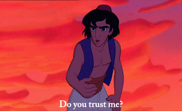 Aladdin holds his hand out and asks if Jasmine trusts him, and she says yes and takes his hand