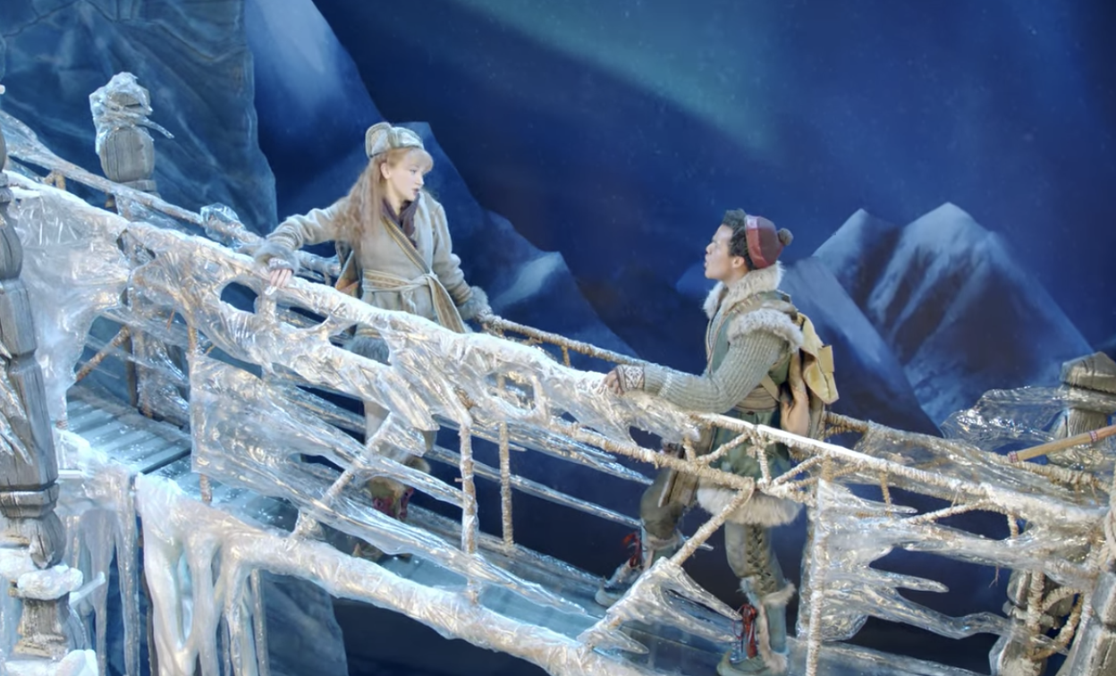 Anna and Kristoff talking on an ice bridge