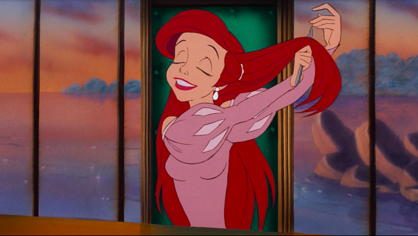 Ariel brushing her hair with a fork