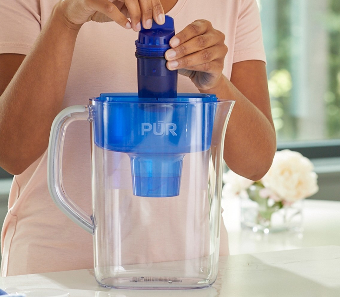 The basic water pitcher with a filter in clean and blue plastic