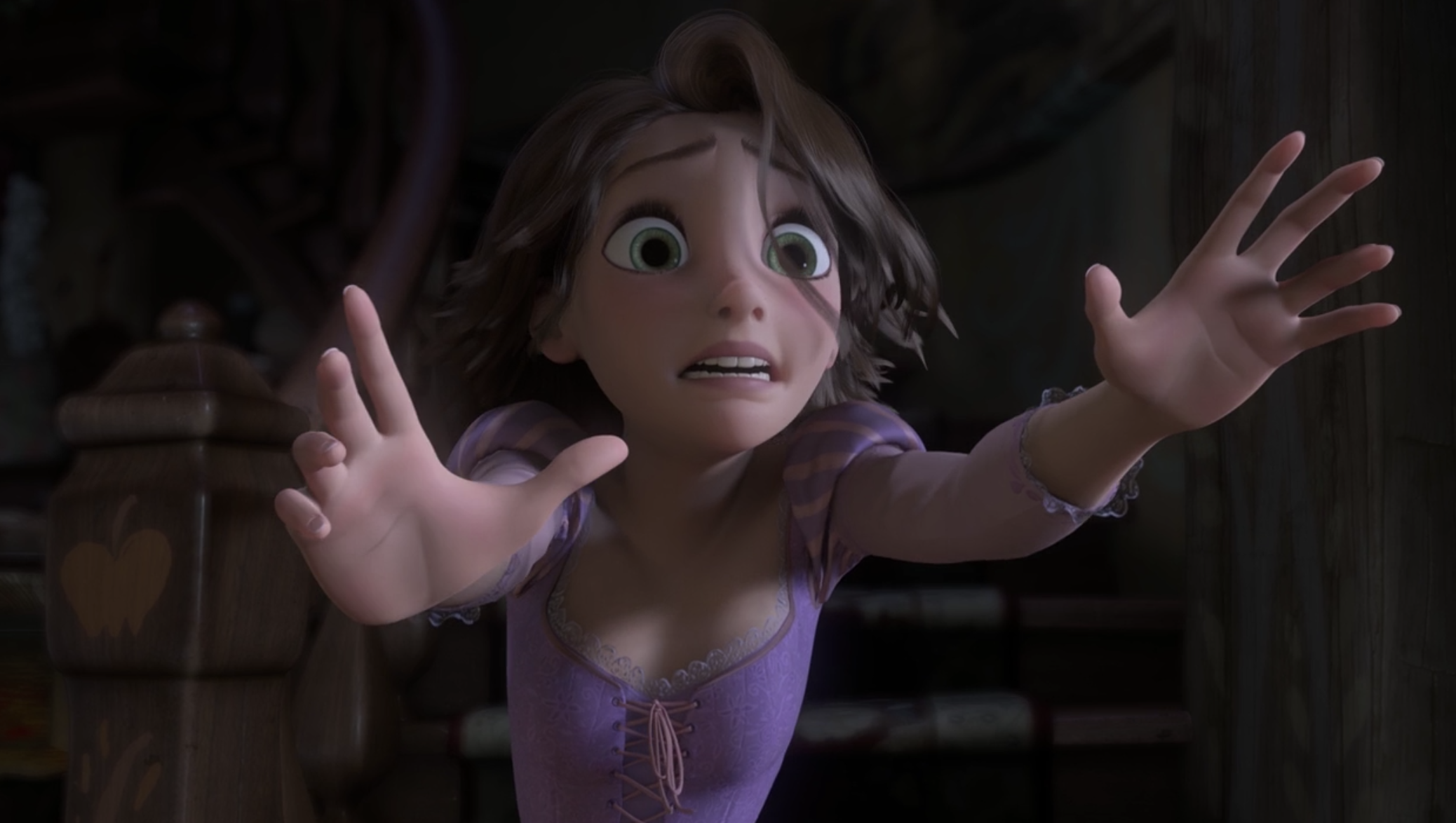 Rapunzel reaching out for Gothel