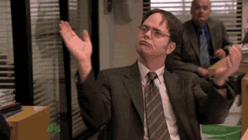 dwight slow clapping while sitting at his desk in &quot;the office&quot;