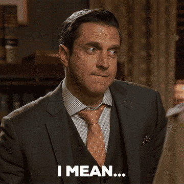 Gif of ADA Rafael Barba from Law and Order SVU nodding his head with the text &quot;I mean...&quot; on it