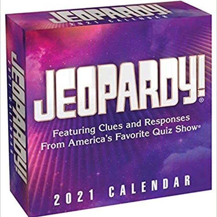 A purple box that reads "Jeopardy! Featuring Clues and Responses From America's Favorite Quiz Show" 