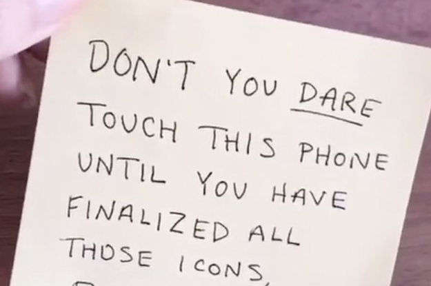 A post it note that says