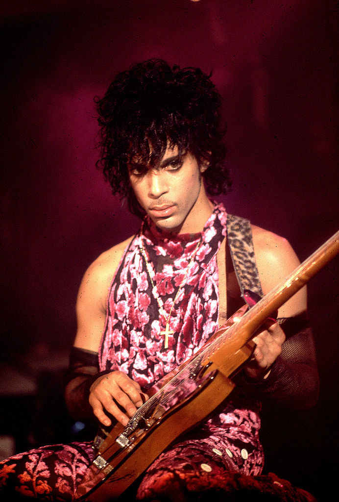 Prince in a silk floral halter dress