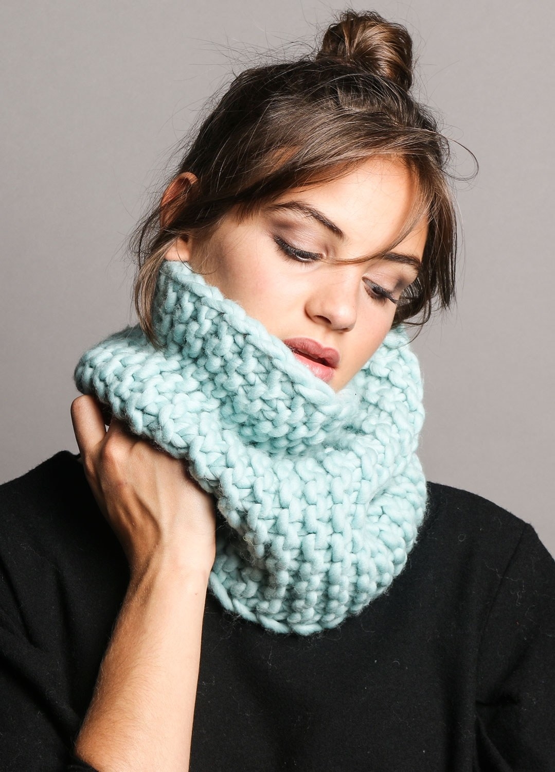 model wearing a light blue snood scarf