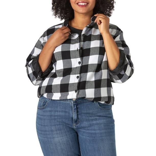 Model in black and white fleece lined flannel tshirt 