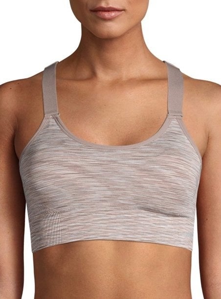 Model in tan seamless sports bra