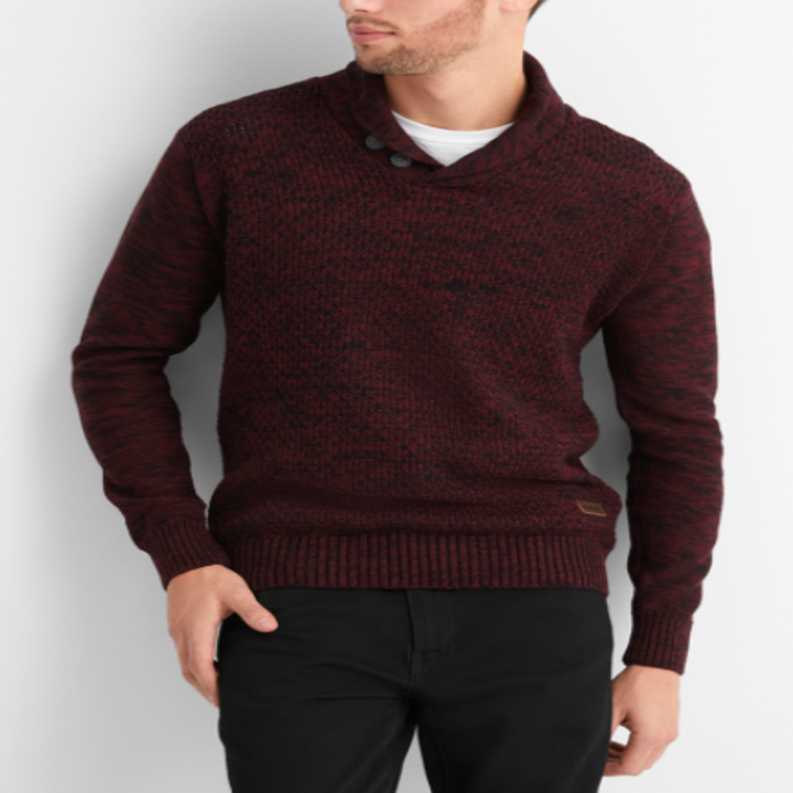 A model wearing a burgundy cowl necked sweater