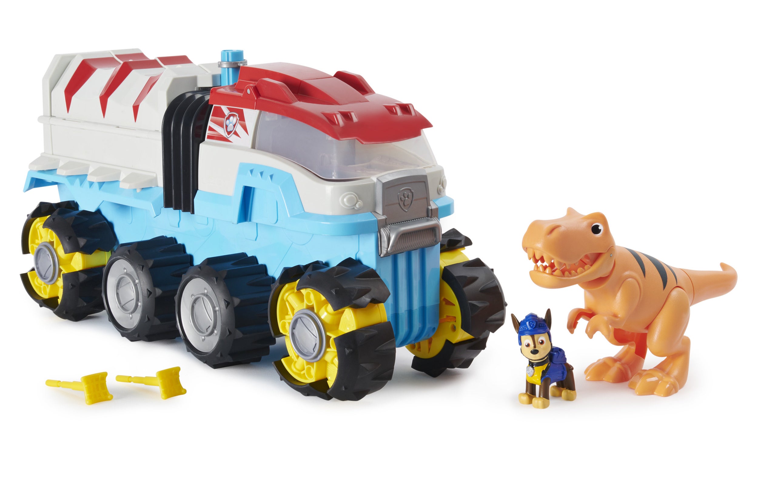 paw patrol vehicle with dinosaur and dog toy at the front