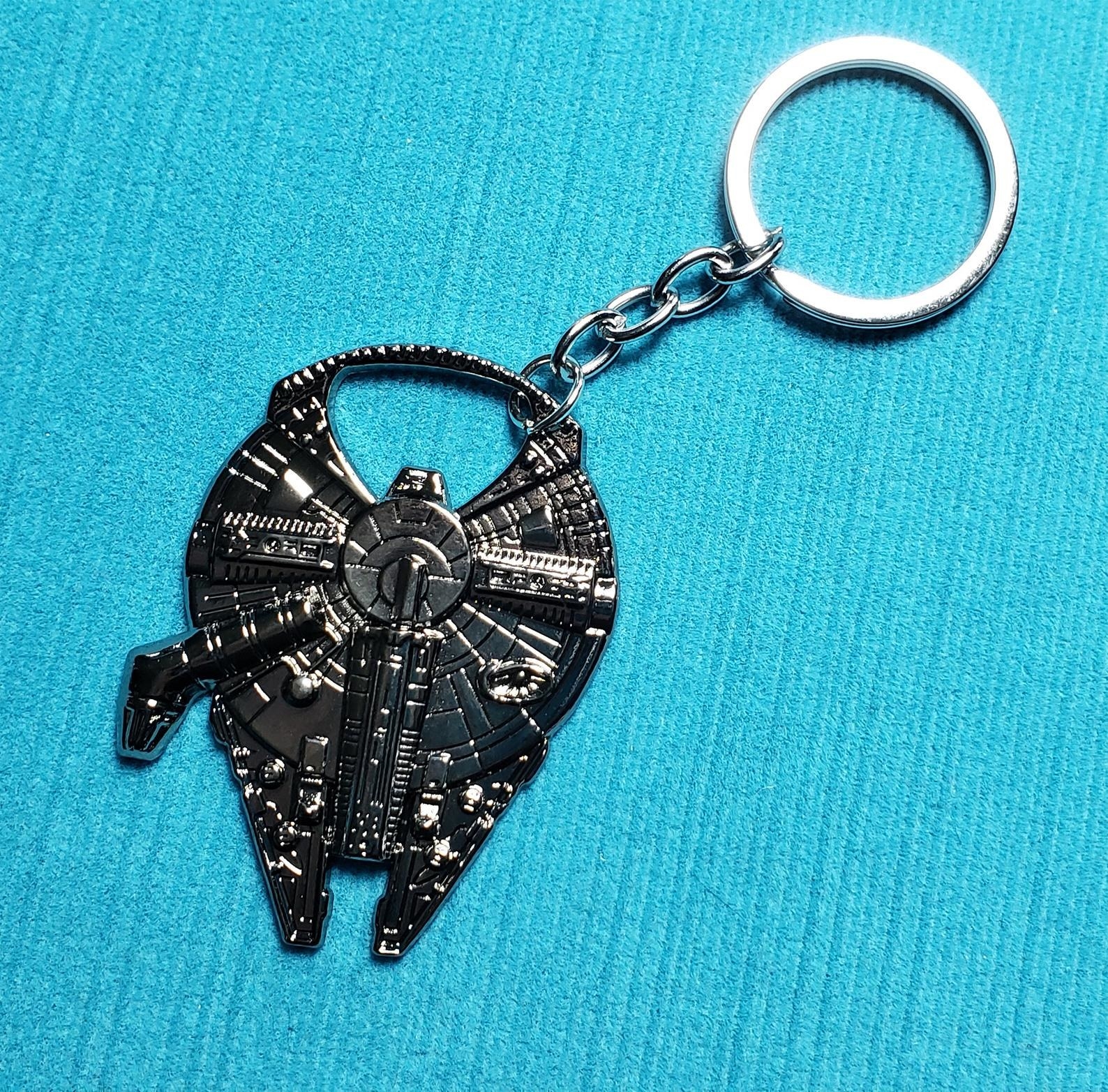 the keychain shaped like the Millenium Falcon of course