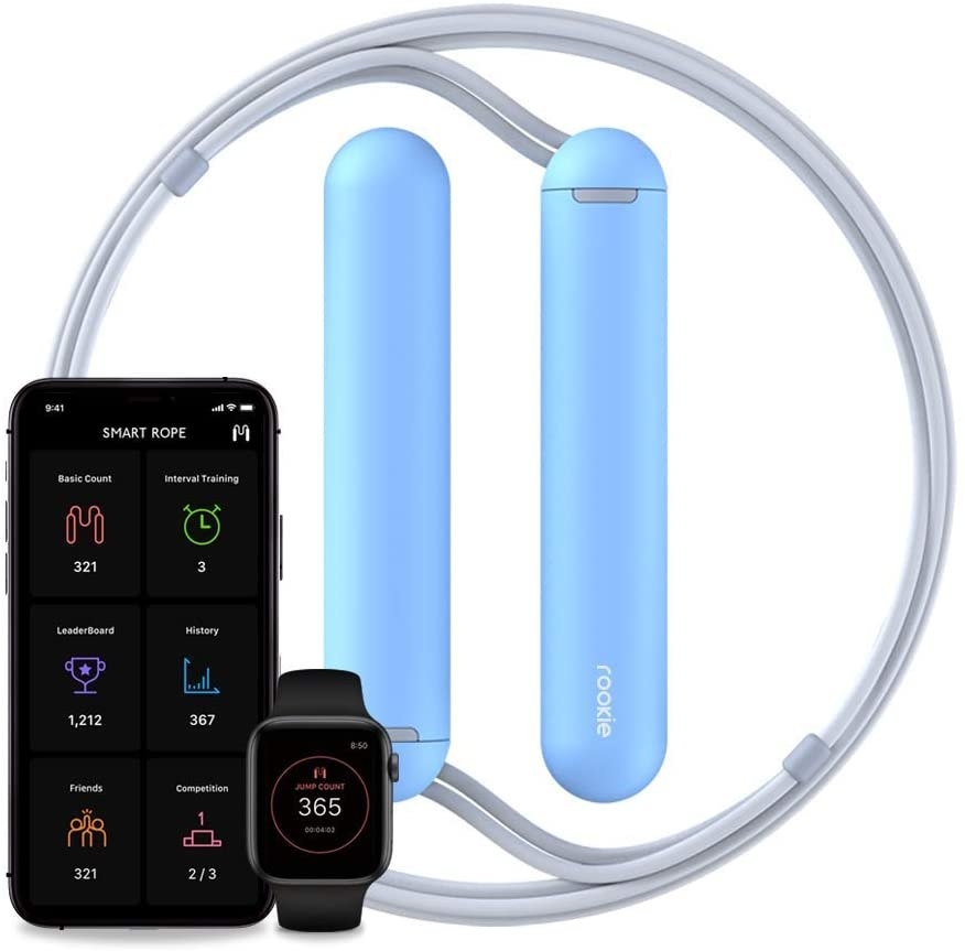 The jump rope in blue next to a smartphone and fitness wearable connected to the accompanying app