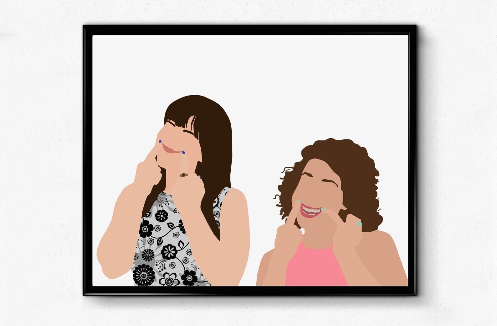 A print with Abby and Ilana making fake smiles with their middle fingers