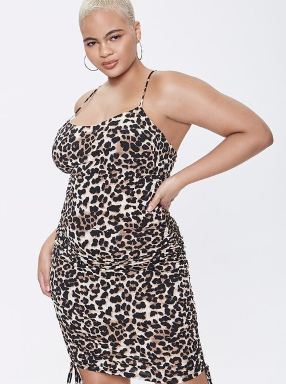 Model is wearing a leopard print dress