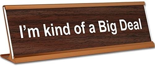 The wood-grain name plate that says &quot;I&#x27;m kind of a Big Deal&quot;