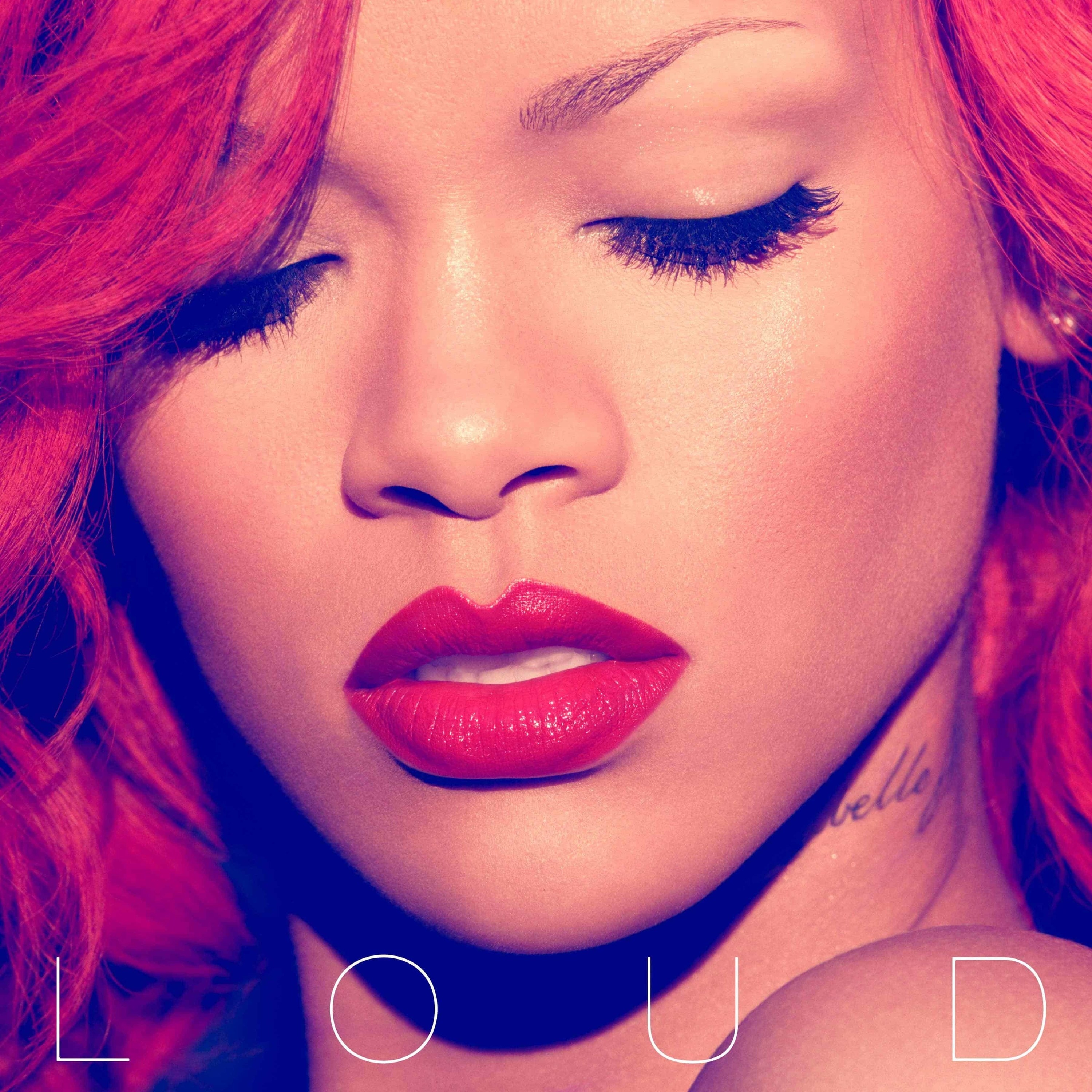 Cover of Loud with Rihanna looking downward wearing bright red lipstick