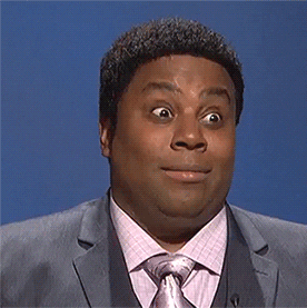 Kenan Thompson&#x27;s eyes go wide in shock as he purses his lips and looks down on SNL