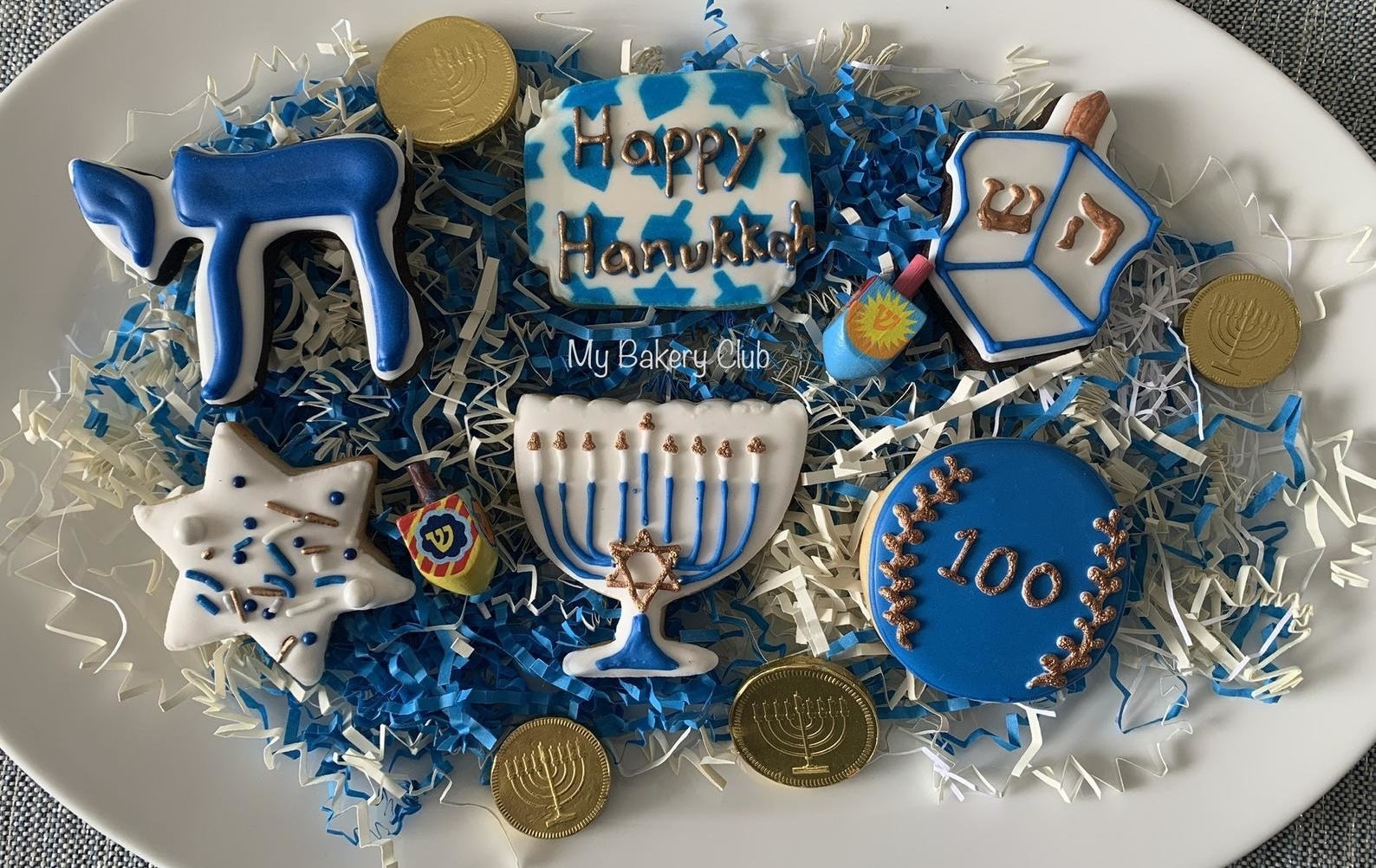 the assortment of cookies on a plate 