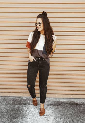 Reviewer wearing the mules in brown