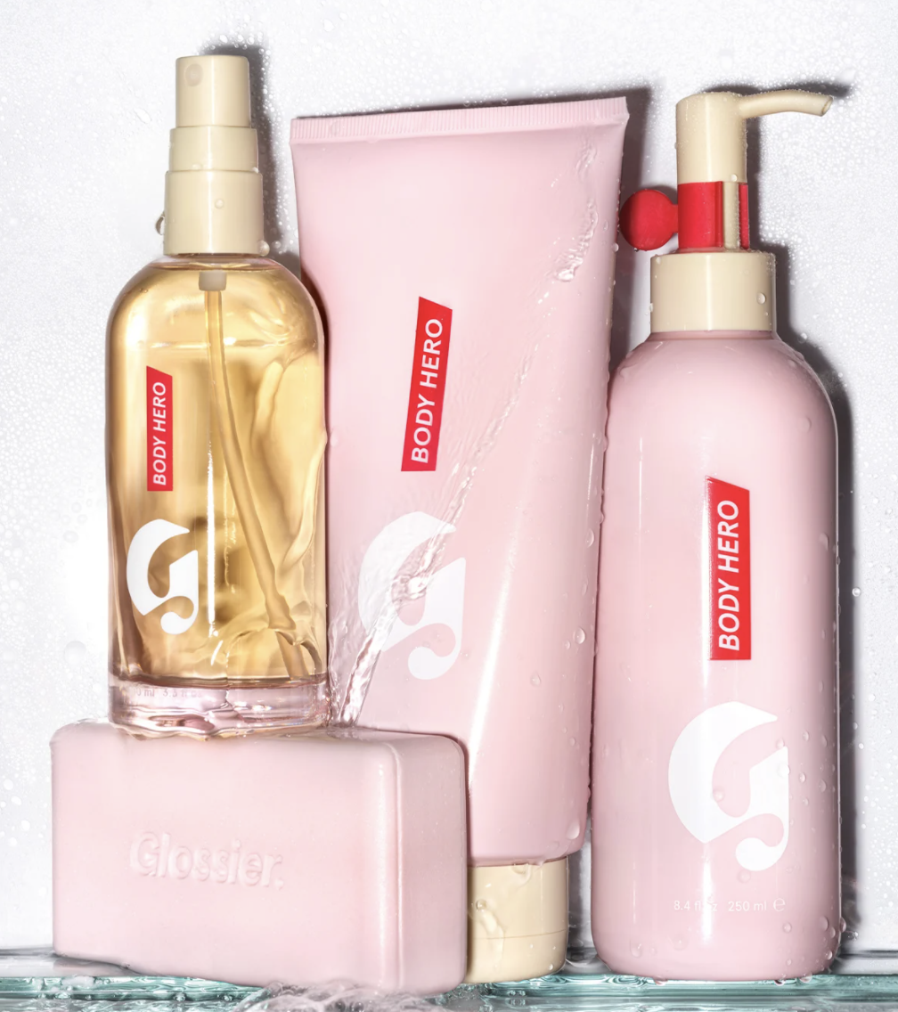 Bottles of Daily Oil Wash, Dry-Touch Oil Mist, Daily Perfecting Cream and an Exfoliator Bar