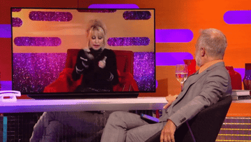 Dolly demonstrates how she hit her fake nails together to create rhythm