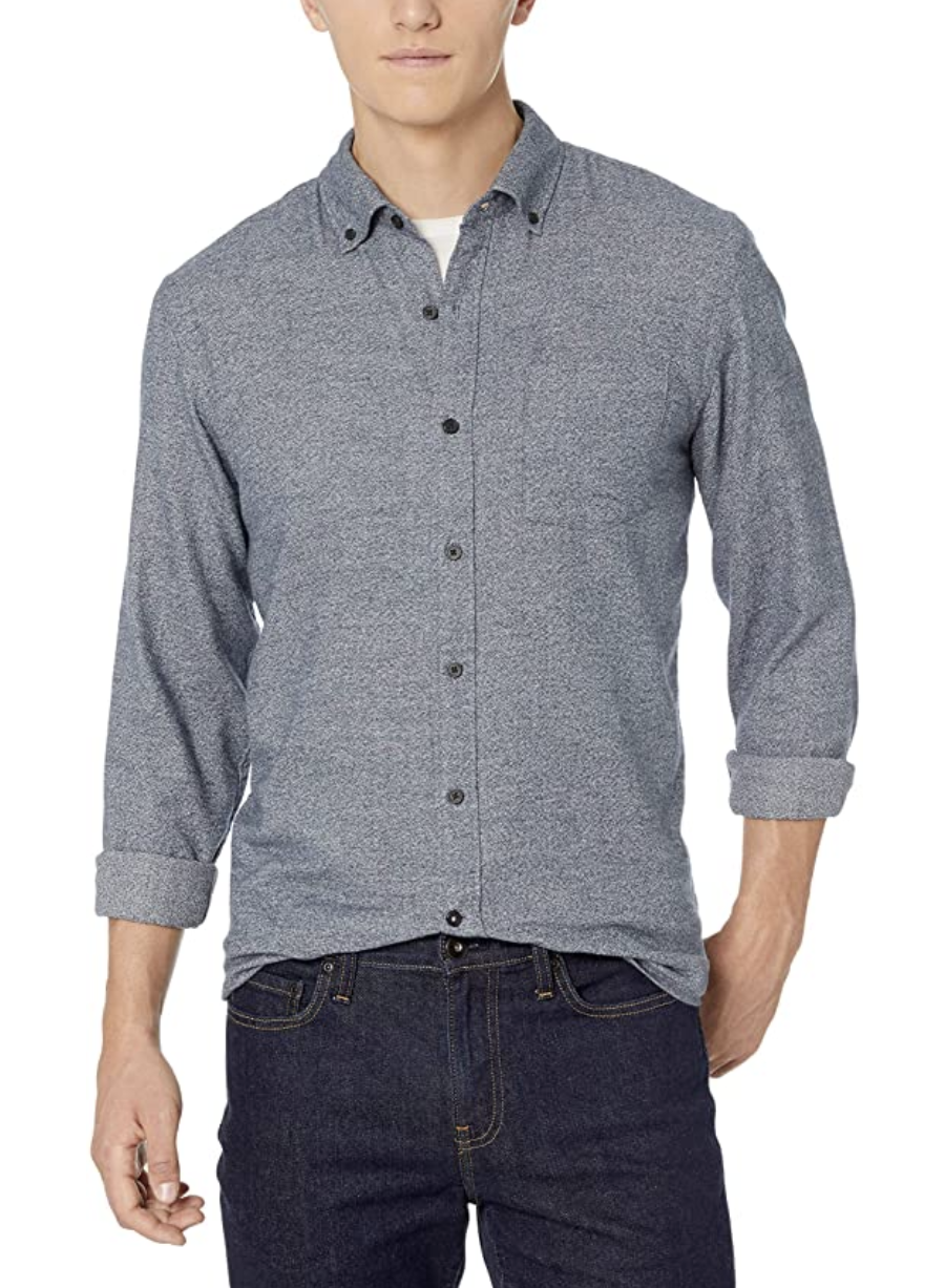 A model in a grey heathered button down long sleeve flannel shirt 