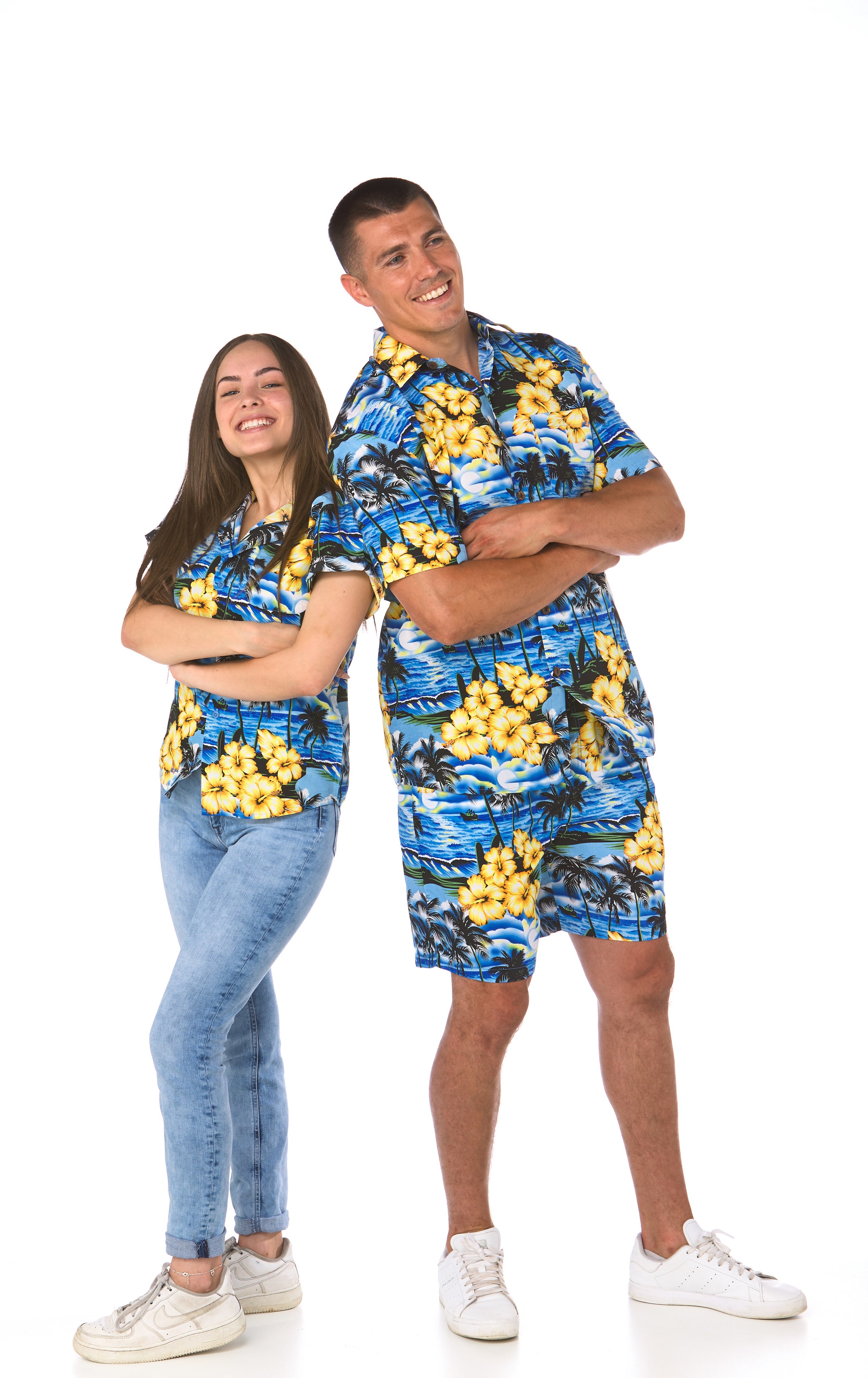 Bright shirt showing waves and the sun with bright yellow hibiscus flowers