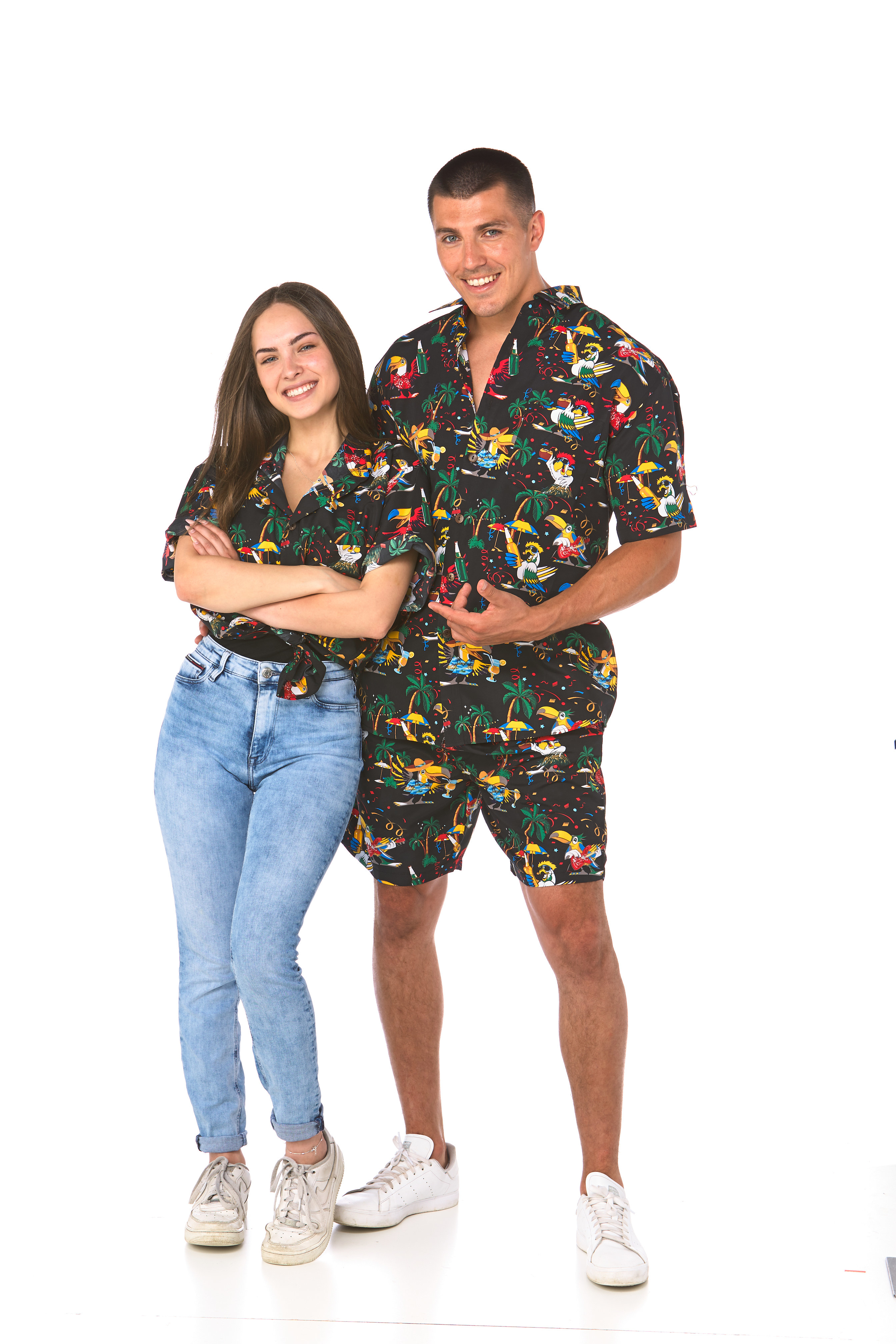 Man and woman wearing a dark shirt with parrots in various holiday scenarios