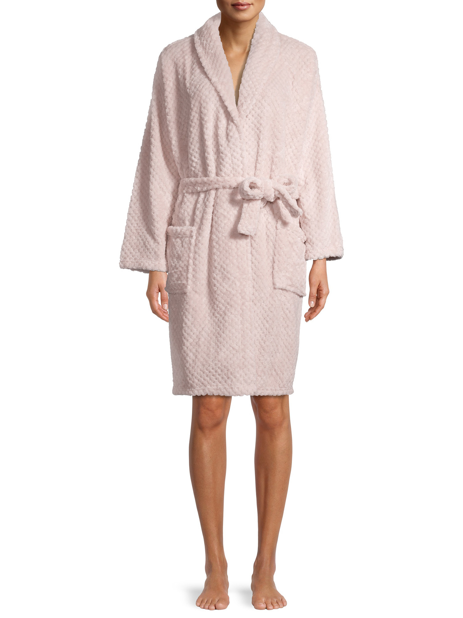 A model wearing the pink plush robe