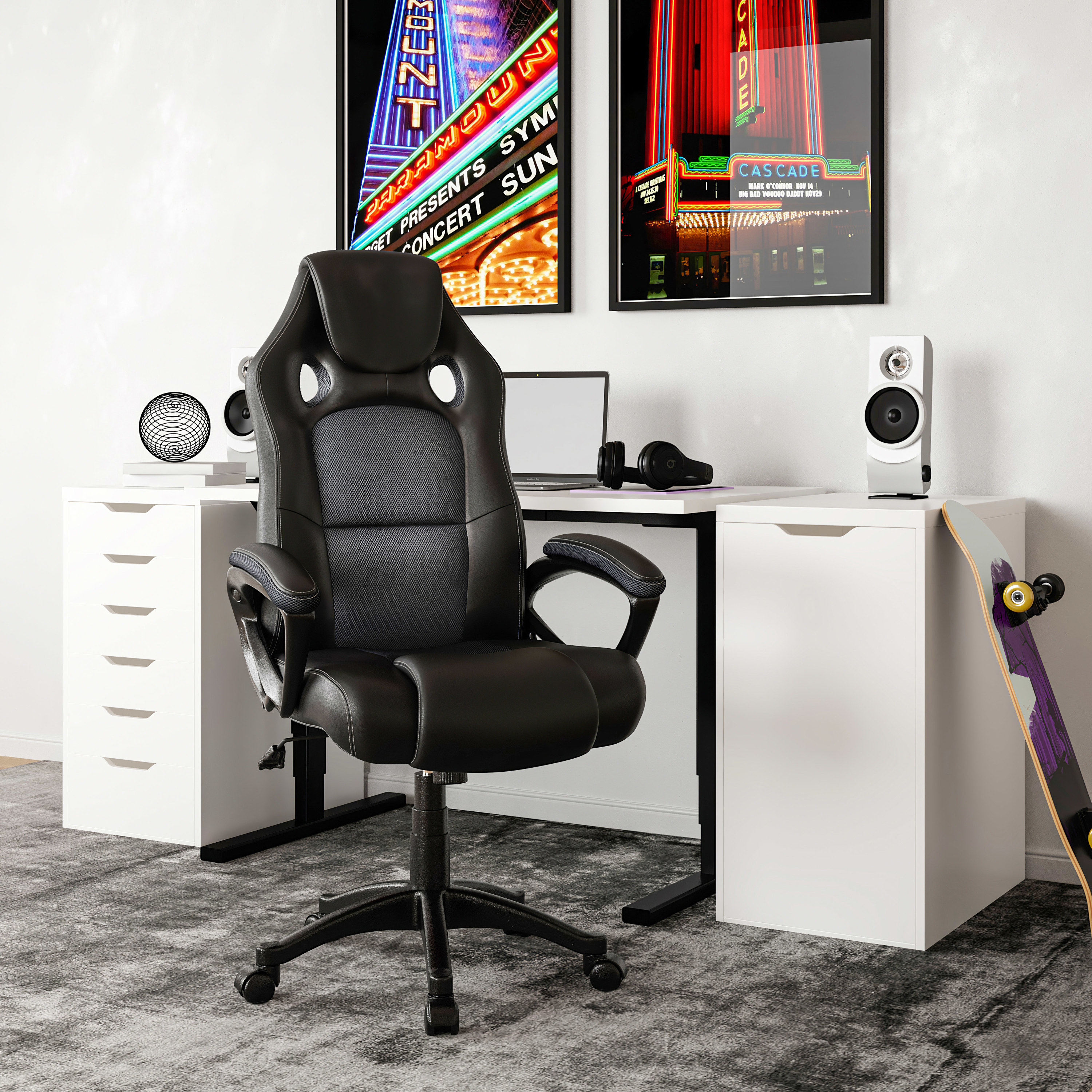 black faux leather office chair in a home office with a white desk