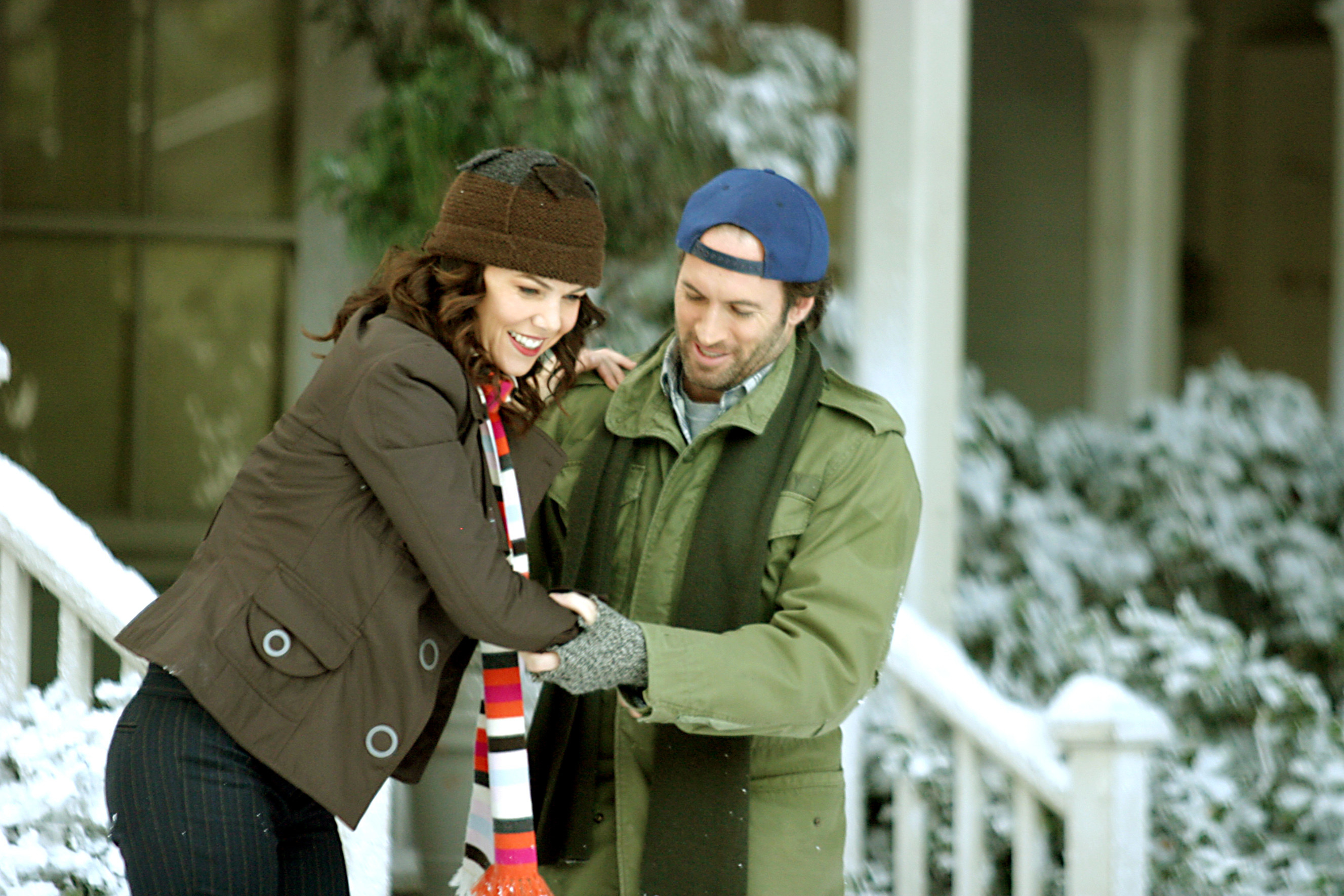 Scott Patterson helping Lauren Graham in a wintry scene