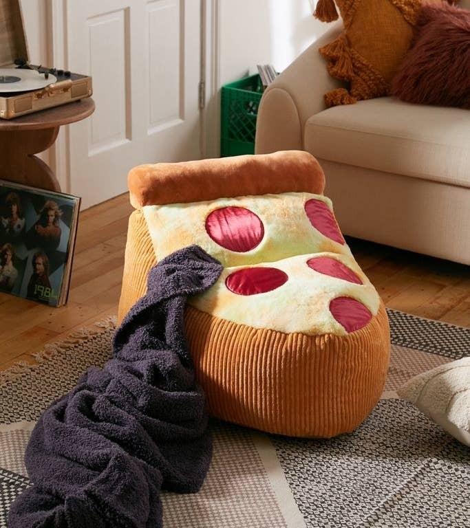 bean bag shaped like pepperoni pizza
