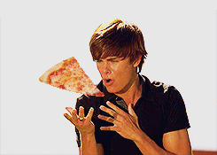 Zac Efron with pizza