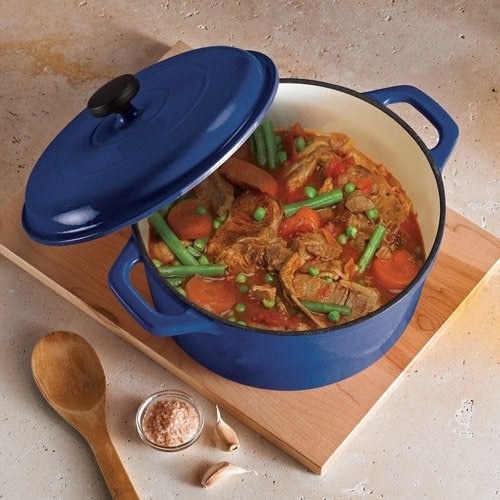 The blue dutch oven full of stew