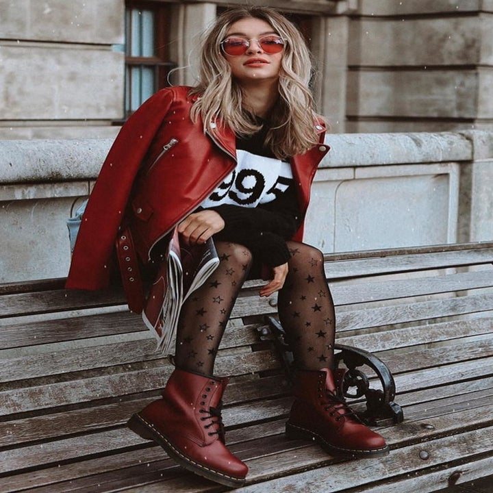 model wearing the boots in dark red