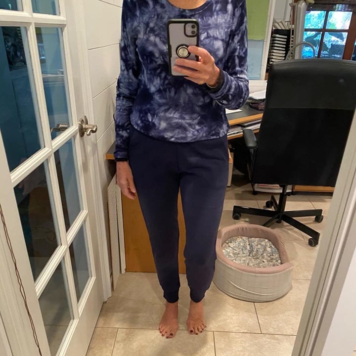 Reviewer wearing the navy version