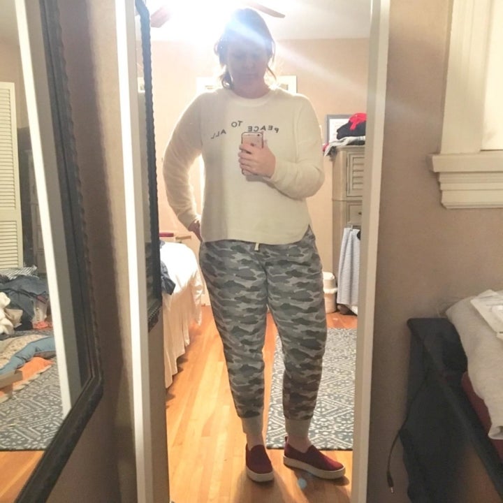 Reviewer wearing the gray camo print