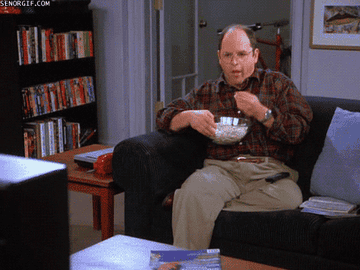 George from Seinfeld eating popcorn 