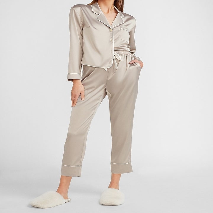 model wearing the beige satin pajama set 