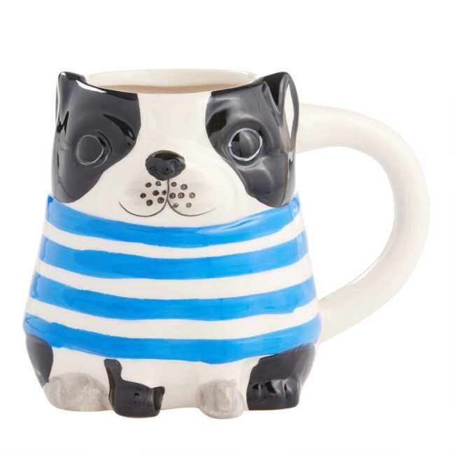 The French bulldog mug which is wearing a white and blue striped shirt