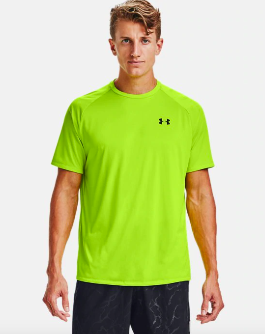 model wearing UA Tech short sleeve shirt in green citrine 